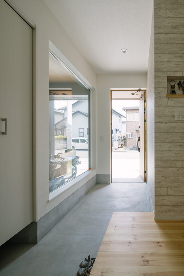 ガレージの見えるこだわり玄関